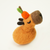 Small plush toy resembling a capybara with a carrot on a white background